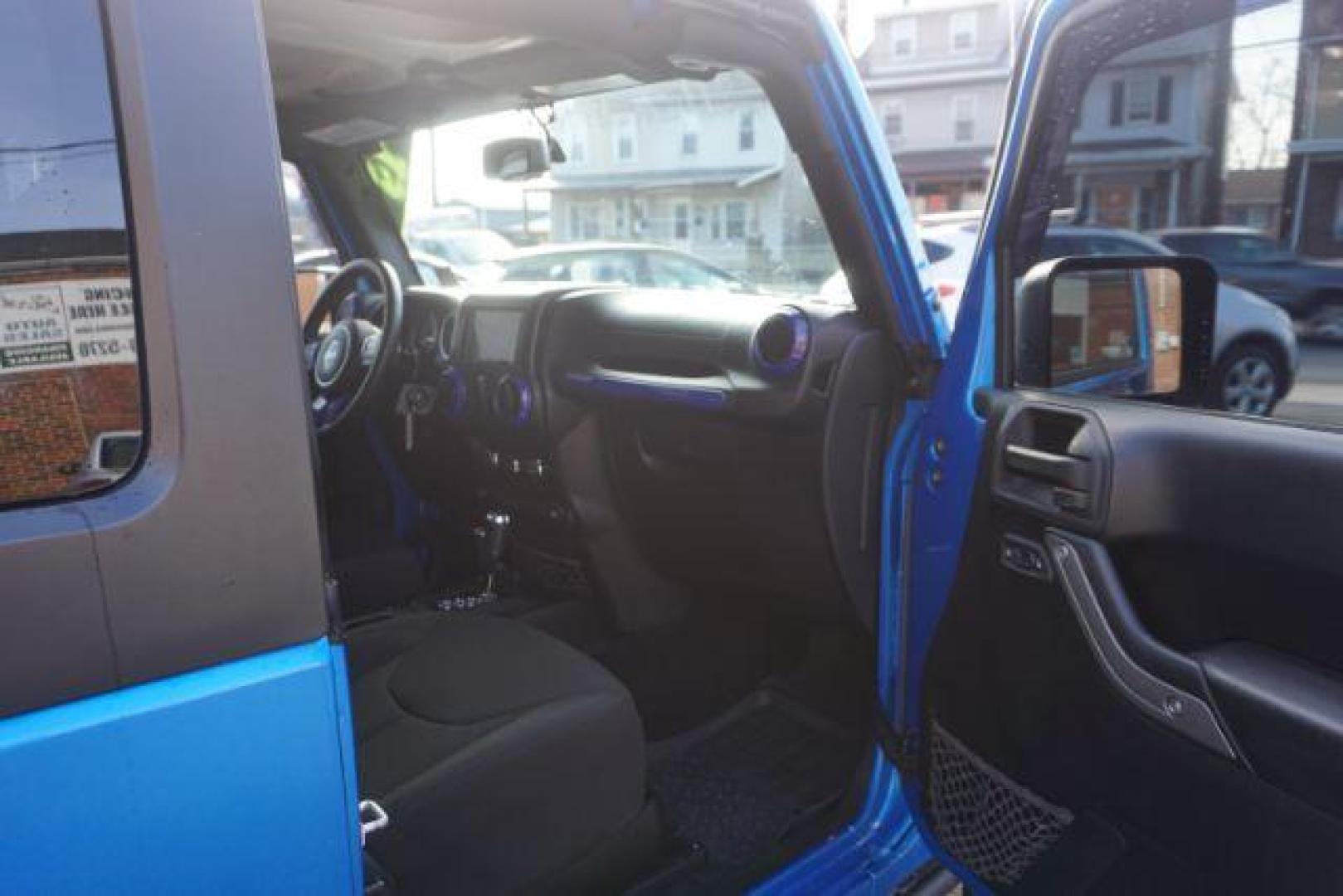 2015 Hydro Blue Pearl Coat /Black Jeep Wrangler Sport 4WD (1C4AJWAG2FL) with an 3.6L V6 DOHC 24V FFV engine, 5-Speed Automatic transmission, located at 312 Centre Ave, Schuylkill Haven, PA, 17972, (570) 593-5278, 40.638130, -76.177383 - bluetooth connection, hard top, locking/limited slip differential, navigation system, towing pkg - Photo#37