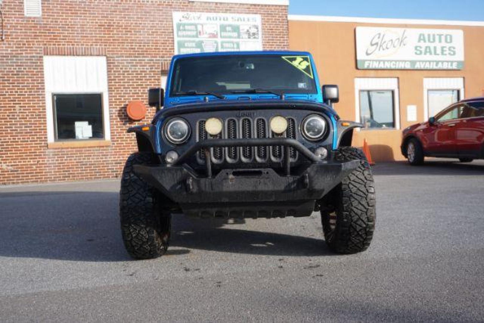 2015 Hydro Blue Pearl Coat /Black Jeep Wrangler Sport 4WD (1C4AJWAG2FL) with an 3.6L V6 DOHC 24V FFV engine, 5-Speed Automatic transmission, located at 312 Centre Ave, Schuylkill Haven, PA, 17972, (570) 593-5278, 40.638130, -76.177383 - bluetooth connection, hard top, locking/limited slip differential, navigation system, towing pkg - Photo#4