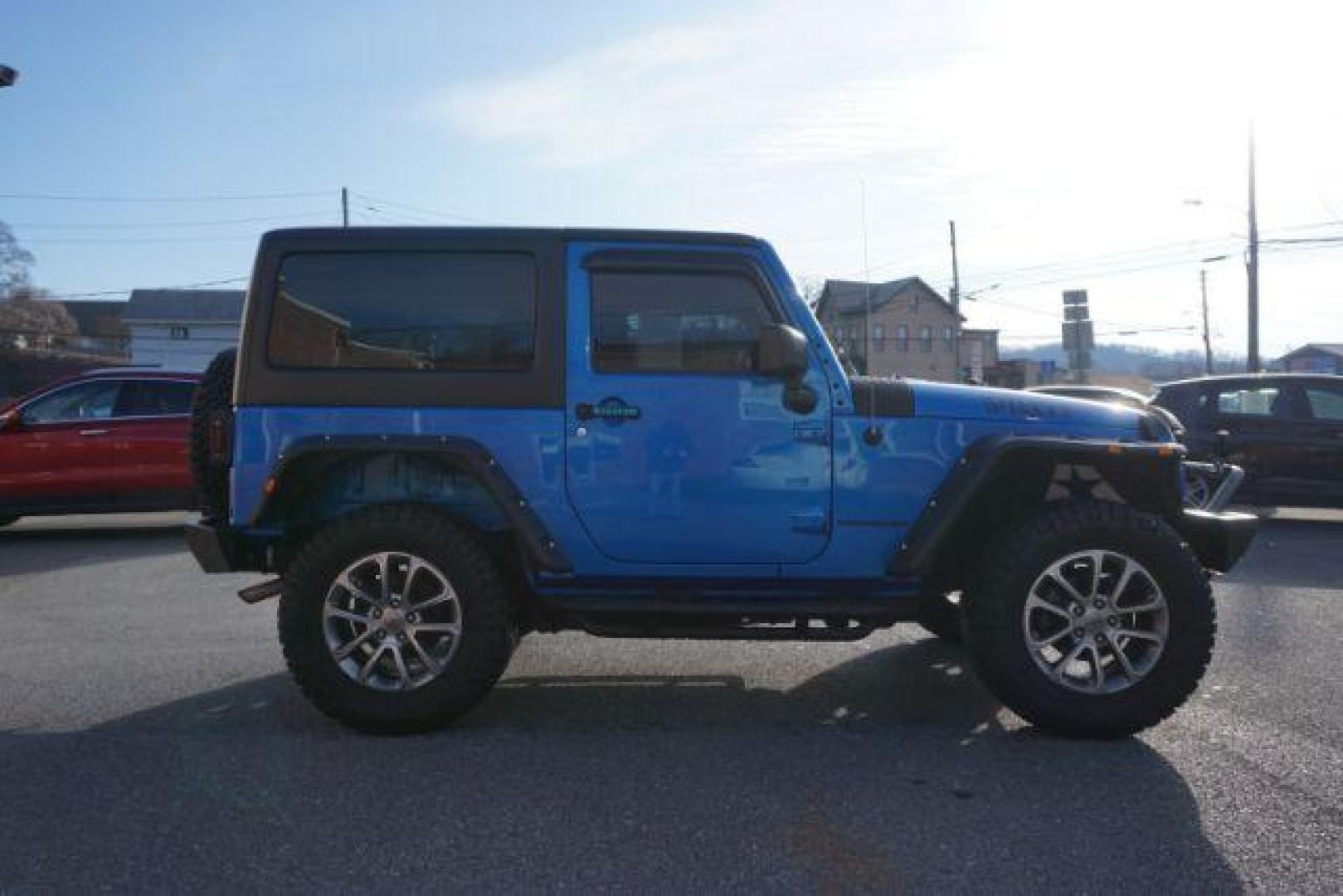 2015 Hydro Blue Pearl Coat /Black Jeep Wrangler Sport 4WD (1C4AJWAG2FL) with an 3.6L V6 DOHC 24V FFV engine, 5-Speed Automatic transmission, located at 312 Centre Ave, Schuylkill Haven, PA, 17972, (570) 593-5278, 40.638130, -76.177383 - bluetooth connection, hard top, locking/limited slip differential, navigation system, towing pkg - Photo#7