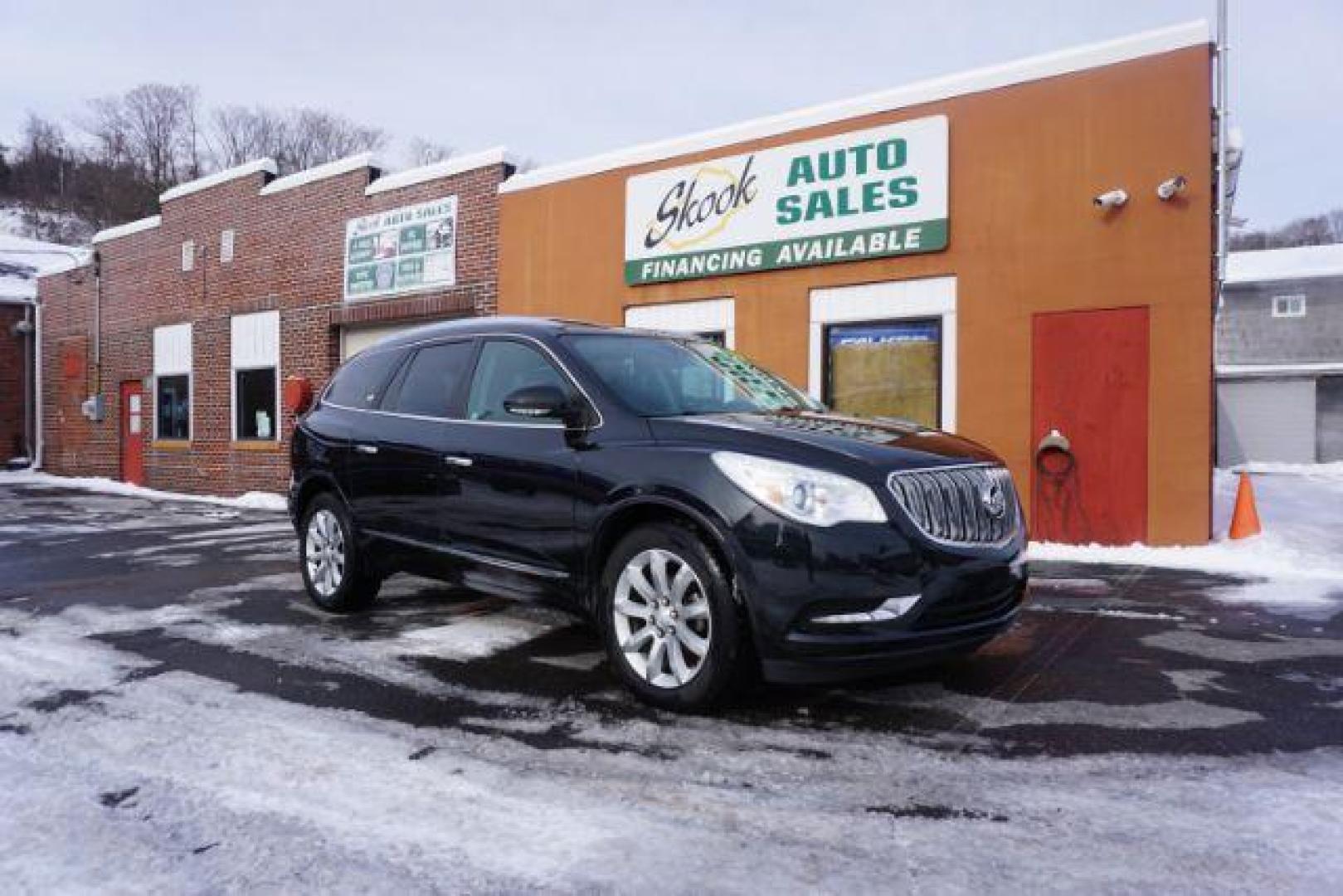 2015 Carbon Black Metallic /Ebony Buick Enclave Premium AWD (5GAKVCKD7FJ) with an 3.6L V6 DOHC 24V engine, 6-Speed Automatic Overdrive transmission, located at 312 Centre Ave, Schuylkill Haven, PA, 17972, (570) 593-5278, 40.638130, -76.177383 - power sunroof, rear entertainment system, towing pkg - Photo#0