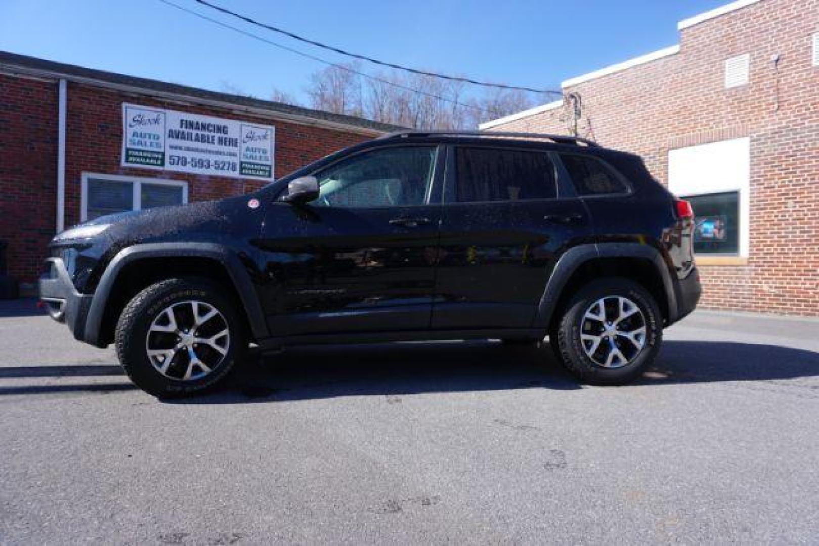 2017 Diamond Black Crystal Pearlcoat /Black Jeep Cherokee Trailhawk 4x4 (1C4PJMBS3HW) with an Pentastar 3.2L V-6 DOHC engine, located at 312 Centre Ave, Schuylkill Haven, PA, 17972, (570) 593-5278, 40.638130, -76.177383 - automatic climate control, heated exterior mirrors, heated front seats, navigation, passive keyless entry, power drivers seat, power liftgate, rear parking sensors, remote engine starter. - Photo#0