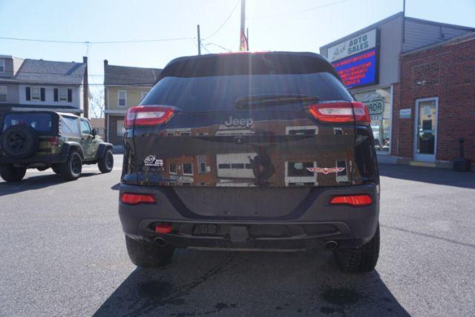 2017 Diamond Black Crystal Pearlcoat /Black Jeep Cherokee Trailhawk 4x4 (1C4PJMBS3HW) with an Pentastar 3.2L V-6 DOHC engine, located at 312 Centre Ave, Schuylkill Haven, PA, 17972, (570) 593-5278, 40.638130, -76.177383 - automatic climate control, heated exterior mirrors, heated front seats, navigation, passive keyless entry, power drivers seat, power liftgate, rear parking sensors, remote engine starter. - Photo#12