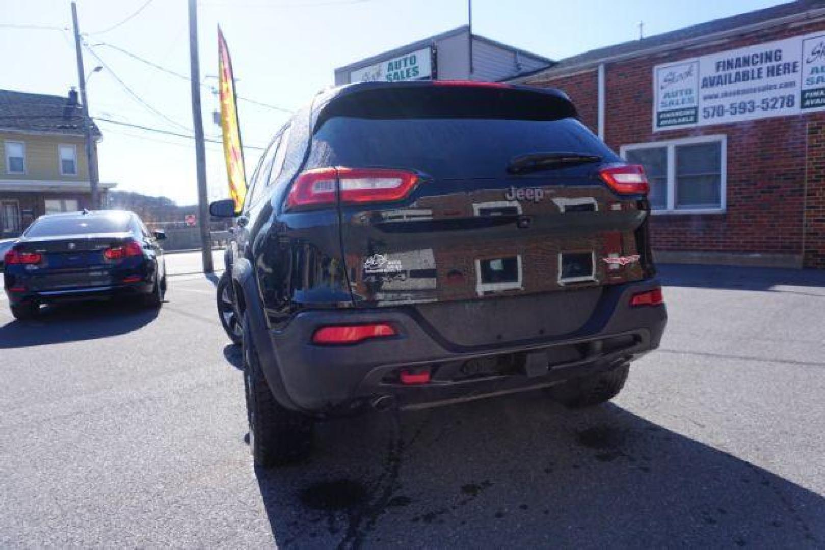 2017 Diamond Black Crystal Pearlcoat /Black Jeep Cherokee Trailhawk 4x4 (1C4PJMBS3HW) with an Pentastar 3.2L V-6 DOHC engine, located at 312 Centre Ave, Schuylkill Haven, PA, 17972, (570) 593-5278, 40.638130, -76.177383 - automatic climate control, heated exterior mirrors, heated front seats, navigation, passive keyless entry, power drivers seat, power liftgate, rear parking sensors, remote engine starter. - Photo#13