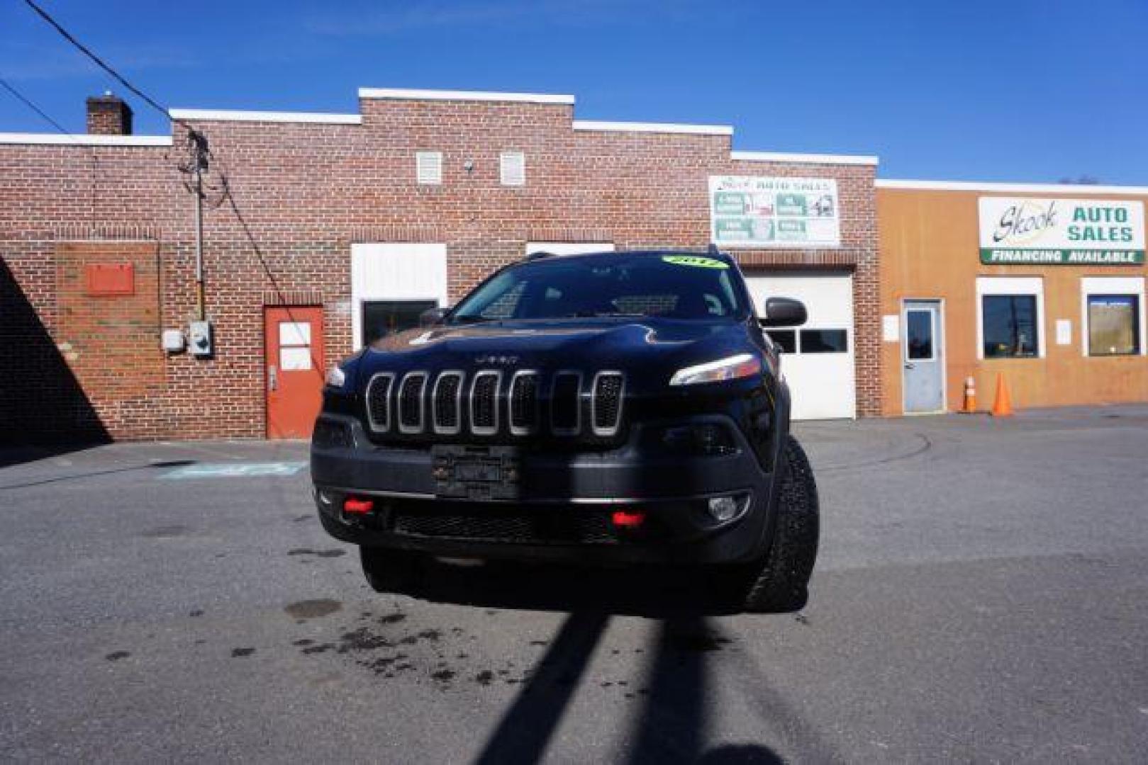 2017 Diamond Black Crystal Pearlcoat /Black Jeep Cherokee Trailhawk 4x4 (1C4PJMBS3HW) with an Pentastar 3.2L V-6 DOHC engine, located at 312 Centre Ave, Schuylkill Haven, PA, 17972, (570) 593-5278, 40.638130, -76.177383 - automatic climate control, heated exterior mirrors, heated front seats, navigation, passive keyless entry, power drivers seat, power liftgate, rear parking sensors, remote engine starter. - Photo#3