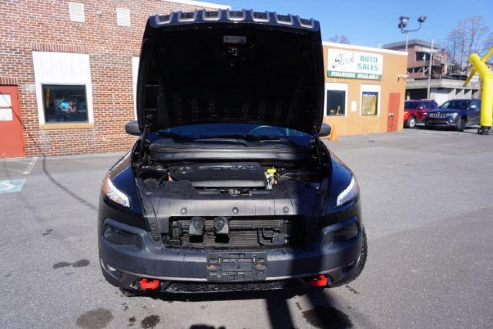 2017 Diamond Black Crystal Pearlcoat /Black Jeep Cherokee Trailhawk 4x4 (1C4PJMBS3HW) with an Pentastar 3.2L V-6 DOHC engine, located at 312 Centre Ave, Schuylkill Haven, PA, 17972, (570) 593-5278, 40.638130, -76.177383 - automatic climate control, heated exterior mirrors, heated front seats, navigation, passive keyless entry, power drivers seat, power liftgate, rear parking sensors, remote engine starter. - Photo#55