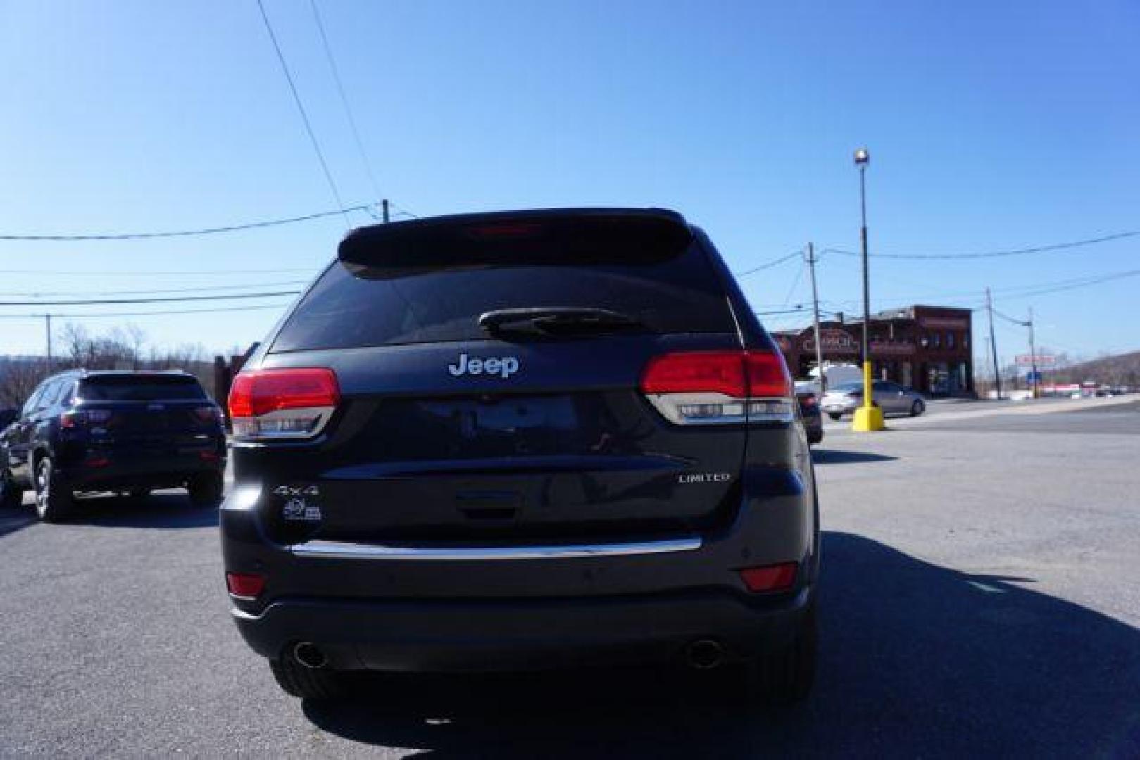 2014 Granite Crystal Metallic Clearcoat /Black Jeep Grand Cherokee Limited (1C4RJFBG9EC) with an 3.6L V-6 DOHC engine, located at 312 Centre Ave, Schuylkill Haven, PA, 17972, (570) 593-5278, 40.638130, -76.177383 - collision avoidance, HID headlamps, navigation, power liftgate, power sunroof, universal garage door opener - Photo#10