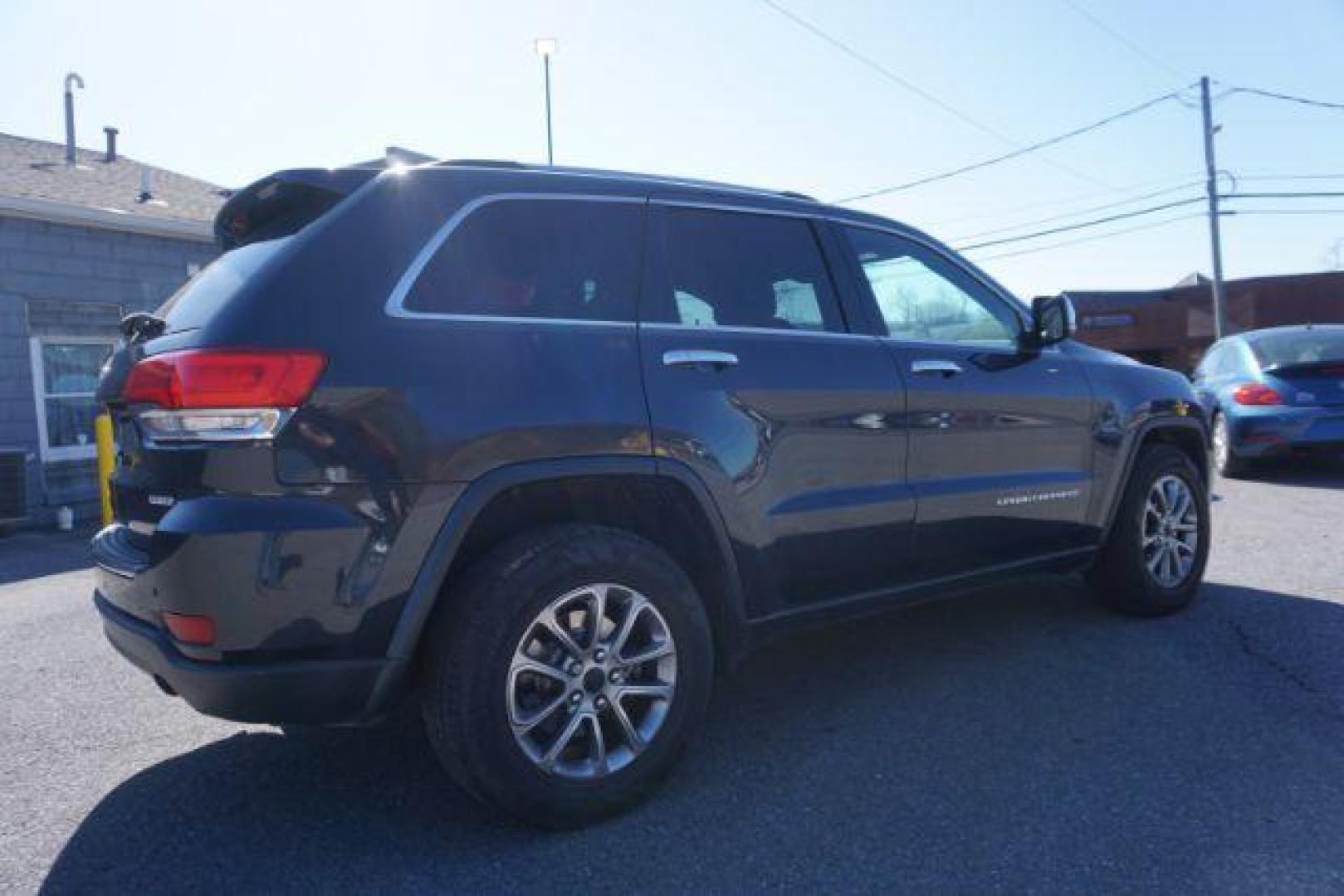 2014 Granite Crystal Metallic Clearcoat /Black Jeep Grand Cherokee Limited (1C4RJFBG9EC) with an 3.6L V-6 DOHC engine, located at 312 Centre Ave, Schuylkill Haven, PA, 17972, (570) 593-5278, 40.638130, -76.177383 - collision avoidance, HID headlamps, navigation, power liftgate, power sunroof, universal garage door opener - Photo#12