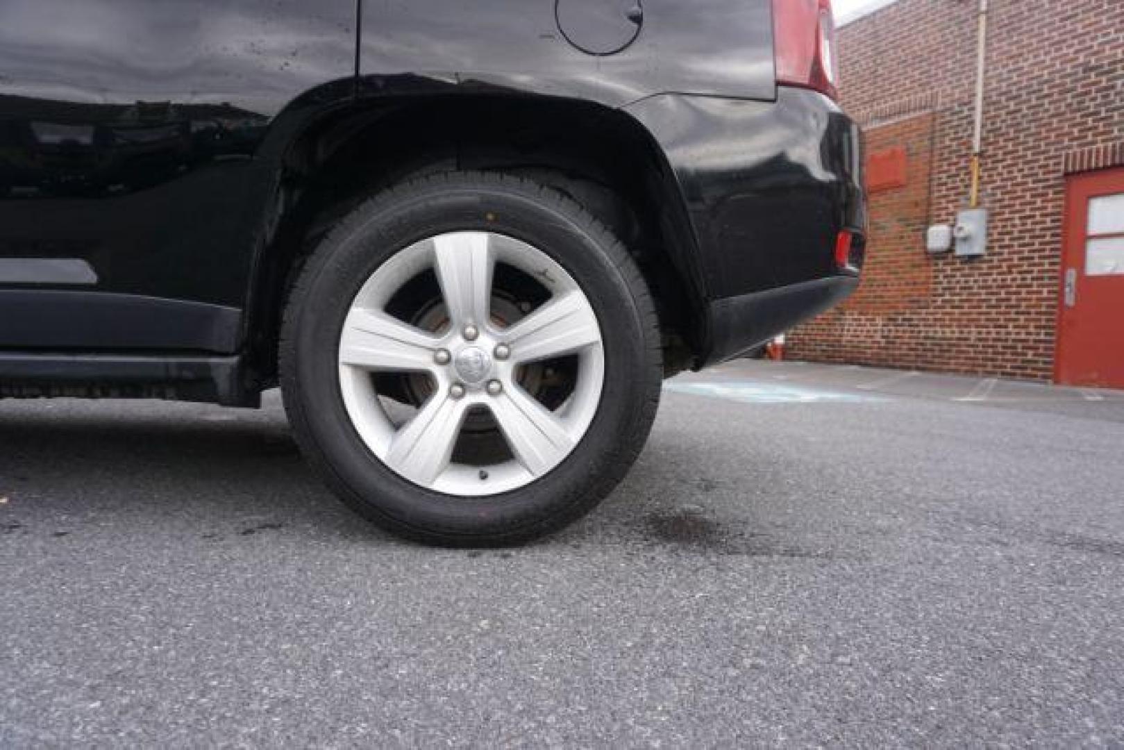 2014 Black Clearcoat /Dark Slate Gray Jeep Compass Latitude (1C4NJDEBXED) with an 2.4L I-4 DOHC engine, located at 312 Centre Ave, Schuylkill Haven, PA, 17972, (570) 593-5278, 40.638130, -76.177383 - bluetooth, locking/limited slip differential - Photo#13