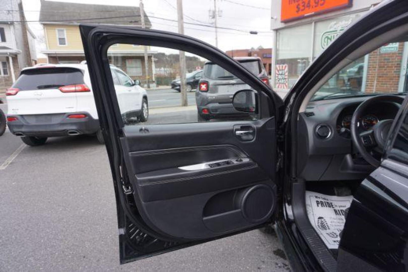 2014 Black Clearcoat /Dark Slate Gray Jeep Compass Latitude (1C4NJDEBXED) with an 2.4L I-4 DOHC engine, located at 312 Centre Ave, Schuylkill Haven, PA, 17972, (570) 593-5278, 40.638130, -76.177383 - bluetooth, locking/limited slip differential - Photo#17