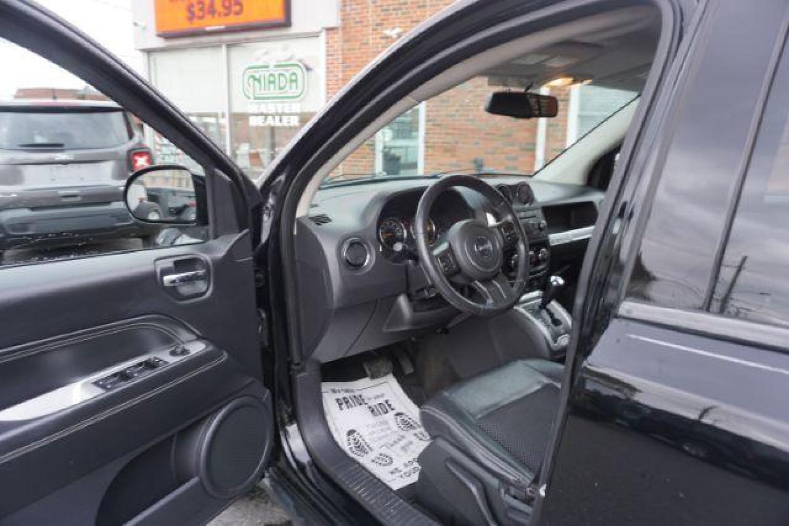 2014 Black Clearcoat /Dark Slate Gray Jeep Compass Latitude (1C4NJDEBXED) with an 2.4L I-4 DOHC engine, located at 312 Centre Ave, Schuylkill Haven, PA, 17972, (570) 593-5278, 40.638130, -76.177383 - bluetooth, locking/limited slip differential - Photo#18