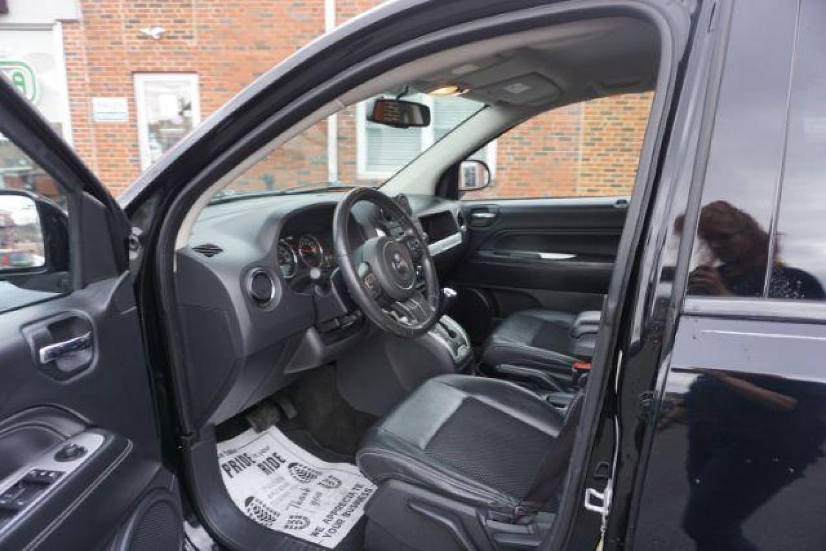 2014 Black Clearcoat /Dark Slate Gray Jeep Compass Latitude (1C4NJDEBXED) with an 2.4L I-4 DOHC engine, located at 312 Centre Ave, Schuylkill Haven, PA, 17972, (570) 593-5278, 40.638130, -76.177383 - bluetooth, locking/limited slip differential - Photo#19