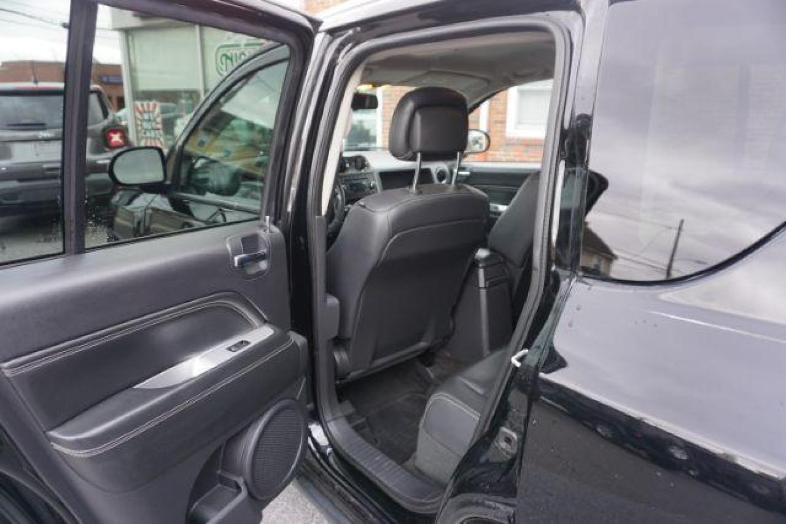 2014 Black Clearcoat /Dark Slate Gray Jeep Compass Latitude (1C4NJDEBXED) with an 2.4L I-4 DOHC engine, located at 312 Centre Ave, Schuylkill Haven, PA, 17972, (570) 593-5278, 40.638130, -76.177383 - bluetooth, locking/limited slip differential - Photo#32