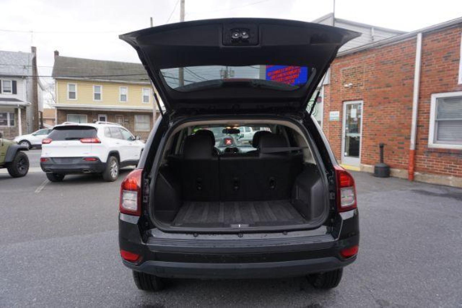 2014 Black Clearcoat /Dark Slate Gray Jeep Compass Latitude (1C4NJDEBXED) with an 2.4L I-4 DOHC engine, located at 312 Centre Ave, Schuylkill Haven, PA, 17972, (570) 593-5278, 40.638130, -76.177383 - bluetooth, locking/limited slip differential - Photo#40