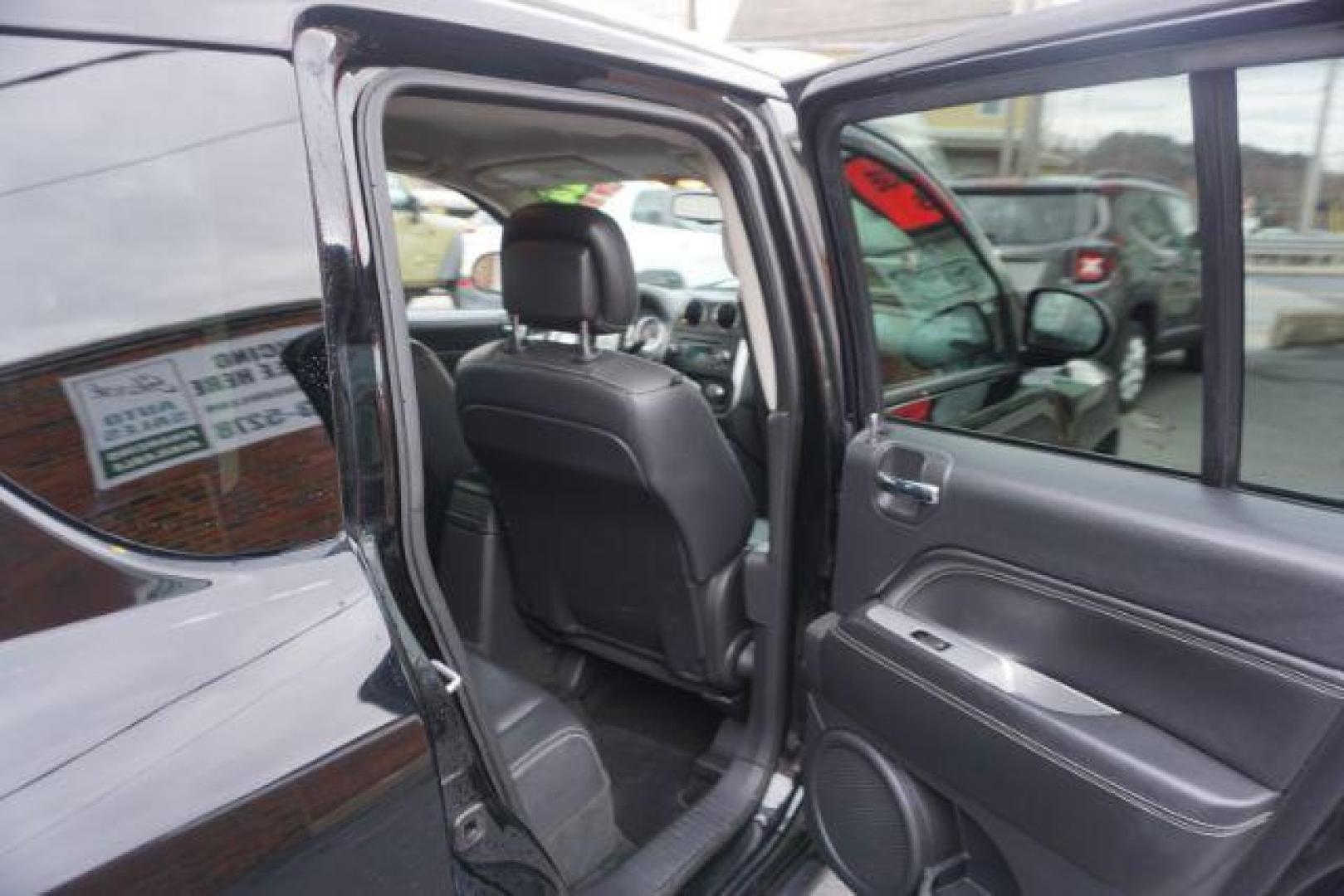 2014 Black Clearcoat /Dark Slate Gray Jeep Compass Latitude (1C4NJDEBXED) with an 2.4L I-4 DOHC engine, located at 312 Centre Ave, Schuylkill Haven, PA, 17972, (570) 593-5278, 40.638130, -76.177383 - bluetooth, locking/limited slip differential - Photo#43