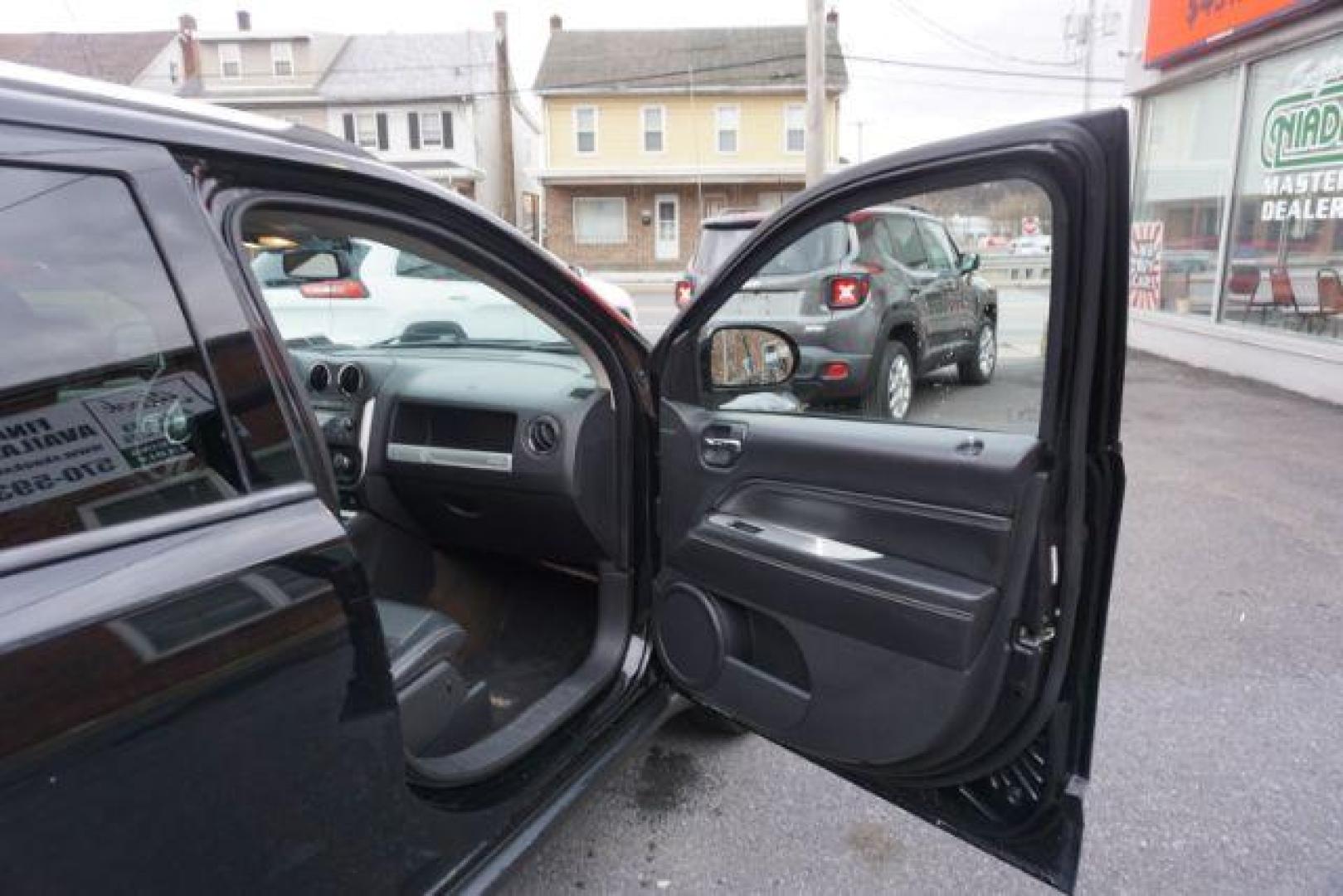 2014 Black Clearcoat /Dark Slate Gray Jeep Compass Latitude (1C4NJDEBXED) with an 2.4L I-4 DOHC engine, located at 312 Centre Ave, Schuylkill Haven, PA, 17972, (570) 593-5278, 40.638130, -76.177383 - bluetooth, locking/limited slip differential - Photo#46