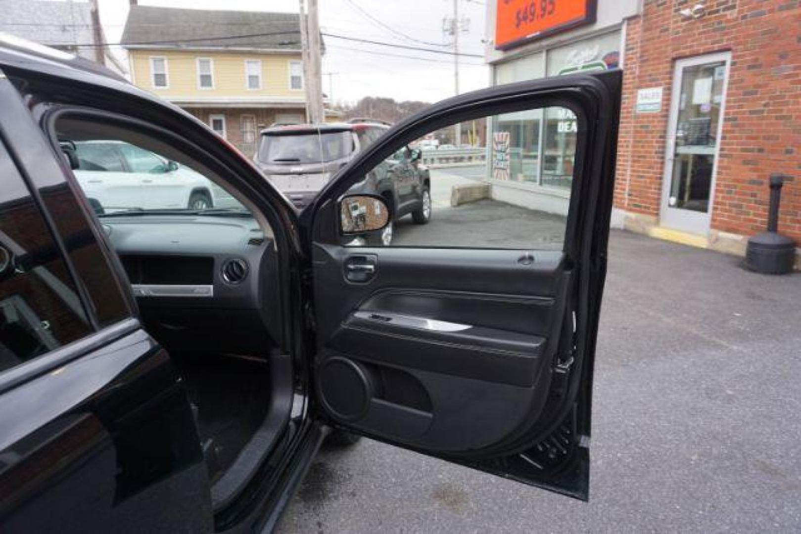 2014 Black Clearcoat /Dark Slate Gray Jeep Compass Latitude (1C4NJDEBXED) with an 2.4L I-4 DOHC engine, located at 312 Centre Ave, Schuylkill Haven, PA, 17972, (570) 593-5278, 40.638130, -76.177383 - bluetooth, locking/limited slip differential - Photo#47