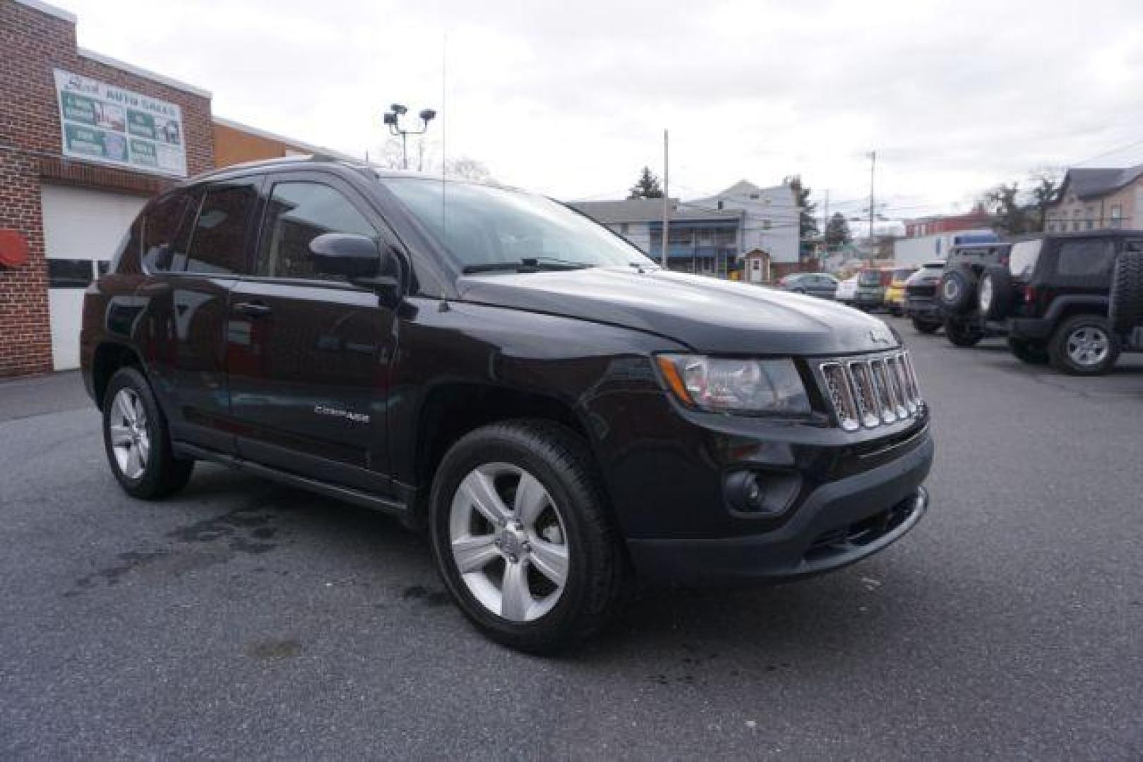 2014 Black Clearcoat /Dark Slate Gray Jeep Compass Latitude (1C4NJDEBXED) with an 2.4L I-4 DOHC engine, located at 312 Centre Ave, Schuylkill Haven, PA, 17972, (570) 593-5278, 40.638130, -76.177383 - bluetooth, locking/limited slip differential - Photo#6