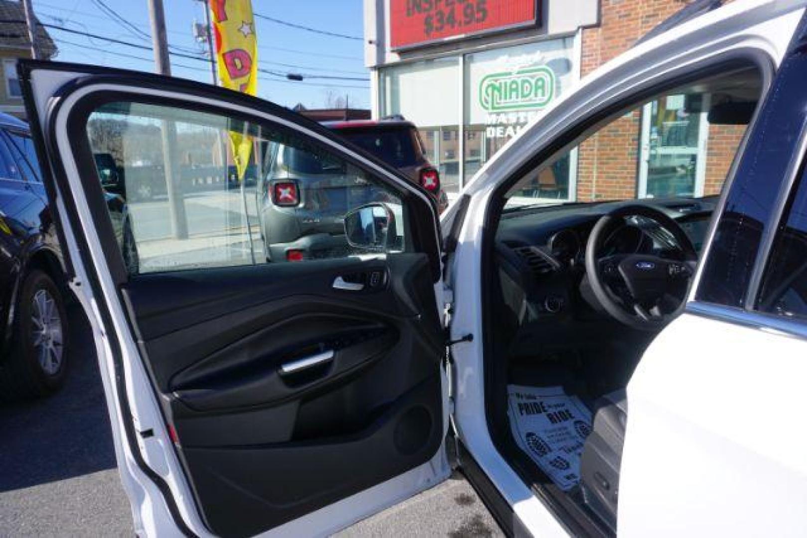 2017 Oxford White /Charcoal Black Ford Escape SE (1FMCU9GDXHU) with an EcoBoost 1.5L I-4 gasoline direct injection engine, located at 312 Centre Ave, Schuylkill Haven, PA, 17972, (570) 593-5278, 40.638130, -76.177383 - blind spot monitor, heated exterior mirrors, heated front seats, leather seats, luggage rack, navigation, power passenger seat, power sunroof, rear parking sensors - Photo#15