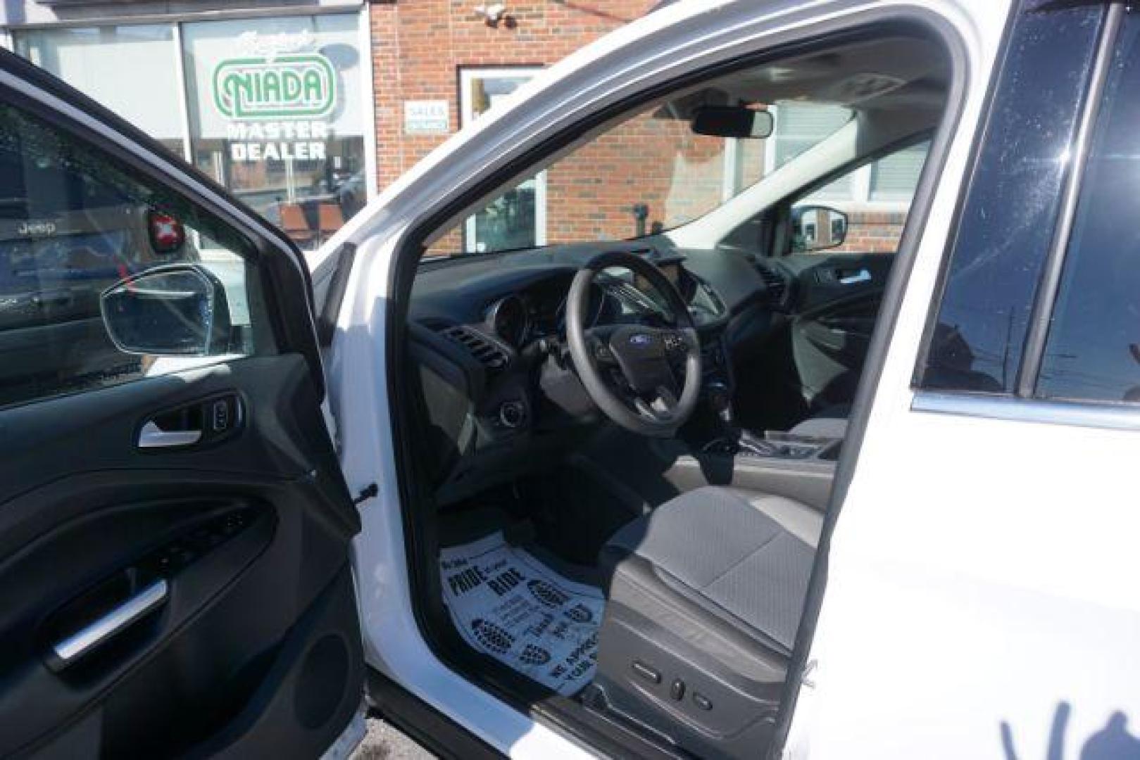 2017 Oxford White /Charcoal Black Ford Escape SE (1FMCU9GDXHU) with an EcoBoost 1.5L I-4 gasoline direct injection engine, located at 312 Centre Ave, Schuylkill Haven, PA, 17972, (570) 593-5278, 40.638130, -76.177383 - blind spot monitor, heated exterior mirrors, heated front seats, leather seats, luggage rack, navigation, power passenger seat, power sunroof, rear parking sensors - Photo#17