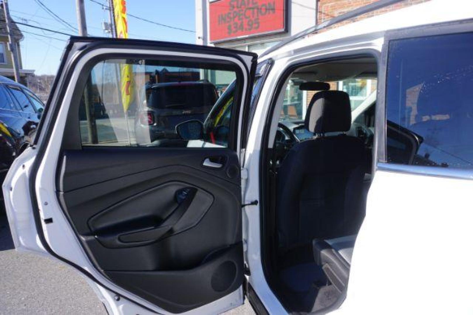 2017 Oxford White /Charcoal Black Ford Escape SE (1FMCU9GDXHU) with an EcoBoost 1.5L I-4 gasoline direct injection engine, located at 312 Centre Ave, Schuylkill Haven, PA, 17972, (570) 593-5278, 40.638130, -76.177383 - blind spot monitor, heated exterior mirrors, heated front seats, leather seats, luggage rack, navigation, power passenger seat, power sunroof, rear parking sensors - Photo#28