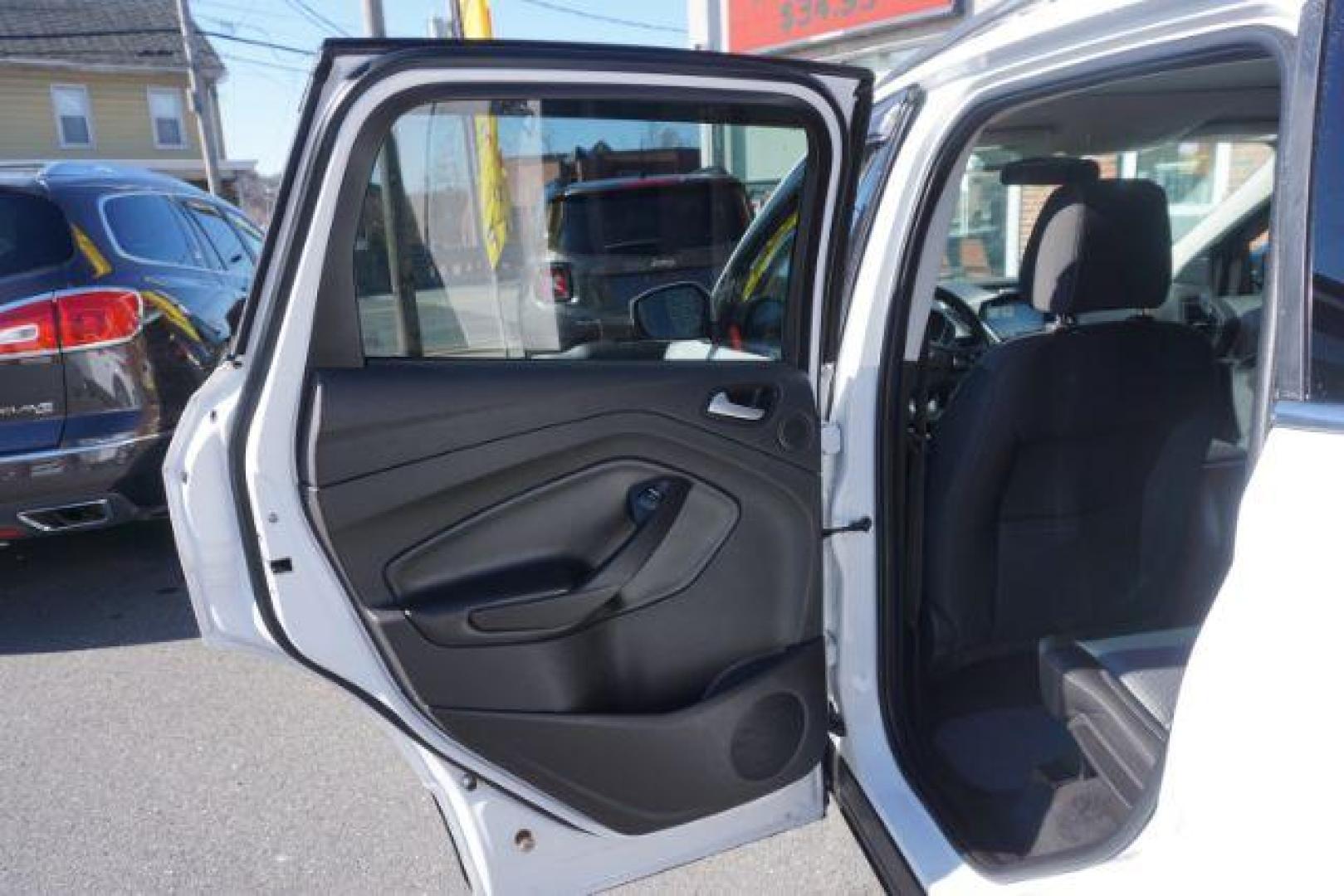 2017 Oxford White /Charcoal Black Ford Escape SE (1FMCU9GDXHU) with an EcoBoost 1.5L I-4 gasoline direct injection engine, located at 312 Centre Ave, Schuylkill Haven, PA, 17972, (570) 593-5278, 40.638130, -76.177383 - blind spot monitor, heated exterior mirrors, heated front seats, leather seats, luggage rack, navigation, power passenger seat, power sunroof, rear parking sensors - Photo#29