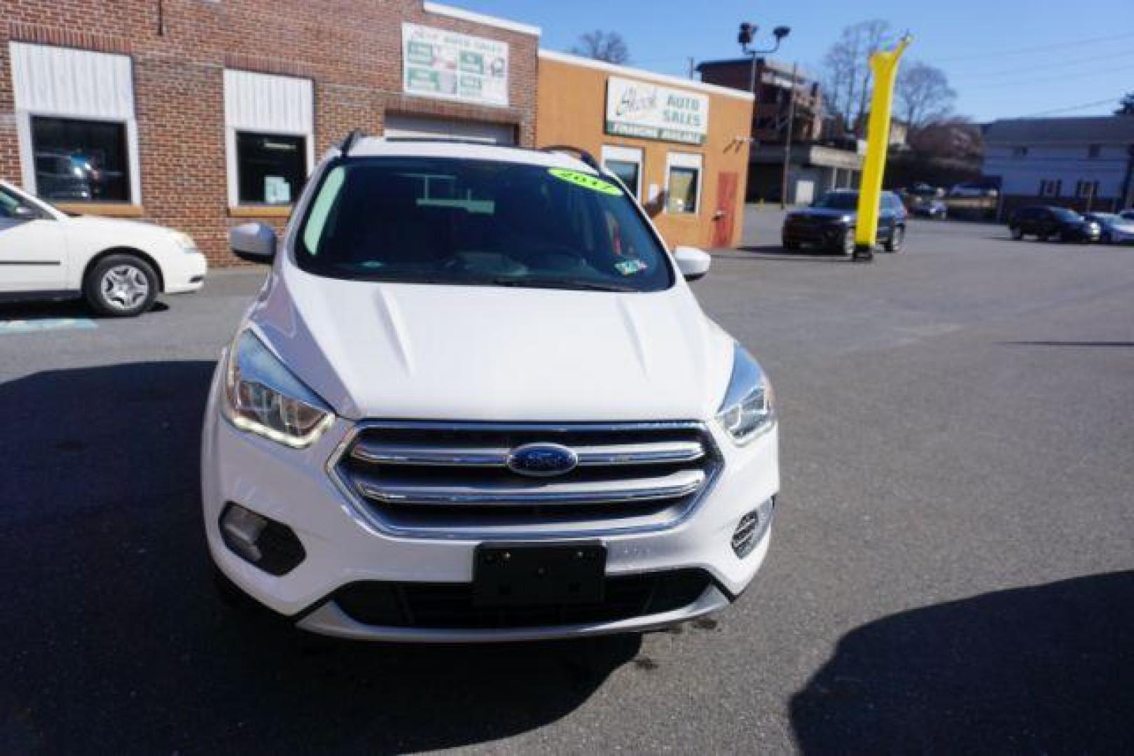 2017 Oxford White /Charcoal Black Ford Escape SE (1FMCU9GDXHU) with an EcoBoost 1.5L I-4 gasoline direct injection engine, located at 312 Centre Ave, Schuylkill Haven, PA, 17972, (570) 593-5278, 40.638130, -76.177383 - blind spot monitor, heated exterior mirrors, heated front seats, leather seats, luggage rack, navigation, power passenger seat, power sunroof, rear parking sensors - Photo#3