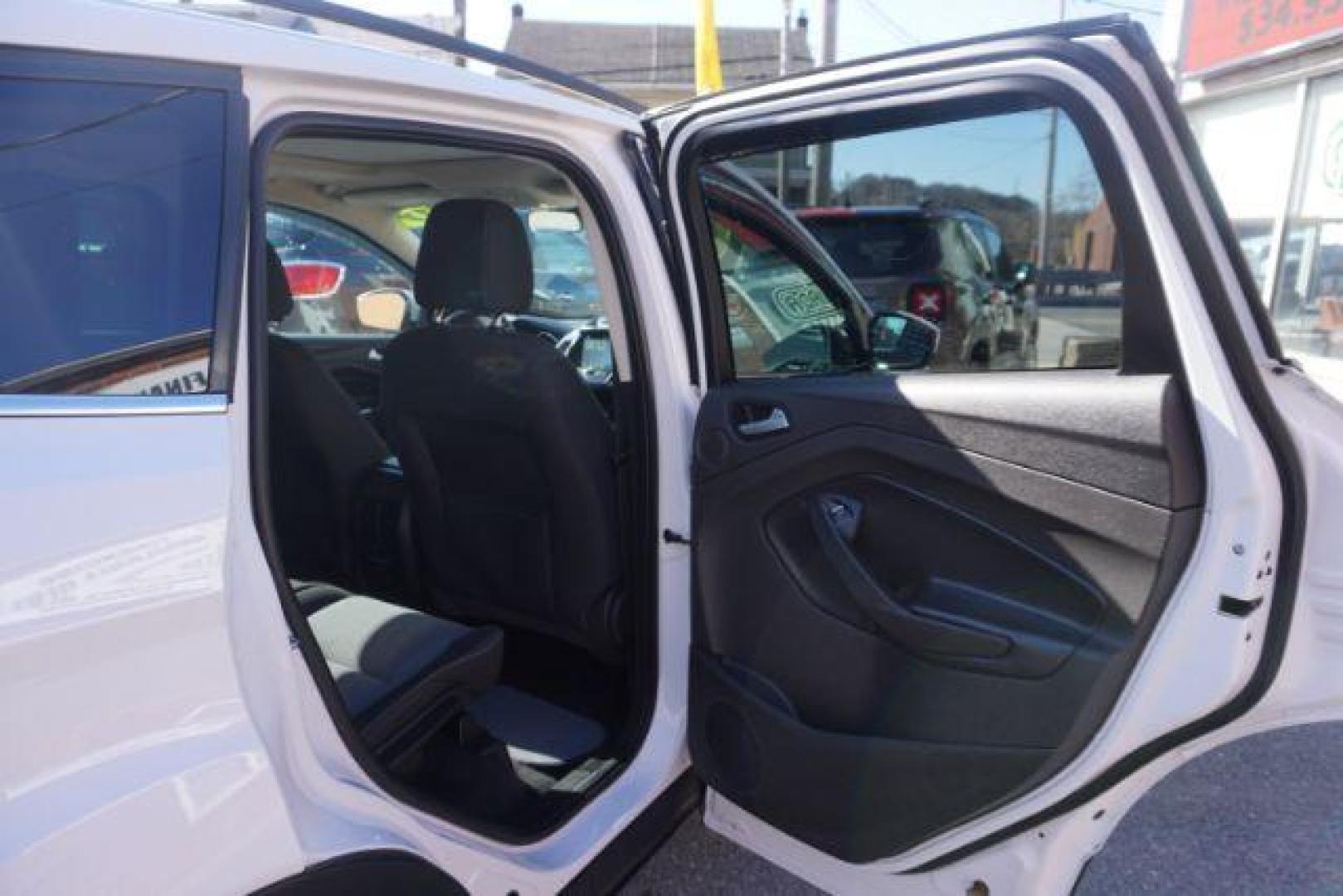 2017 Oxford White /Charcoal Black Ford Escape SE (1FMCU9GDXHU) with an EcoBoost 1.5L I-4 gasoline direct injection engine, located at 312 Centre Ave, Schuylkill Haven, PA, 17972, (570) 593-5278, 40.638130, -76.177383 - blind spot monitor, heated exterior mirrors, heated front seats, leather seats, luggage rack, navigation, power passenger seat, power sunroof, rear parking sensors - Photo#40