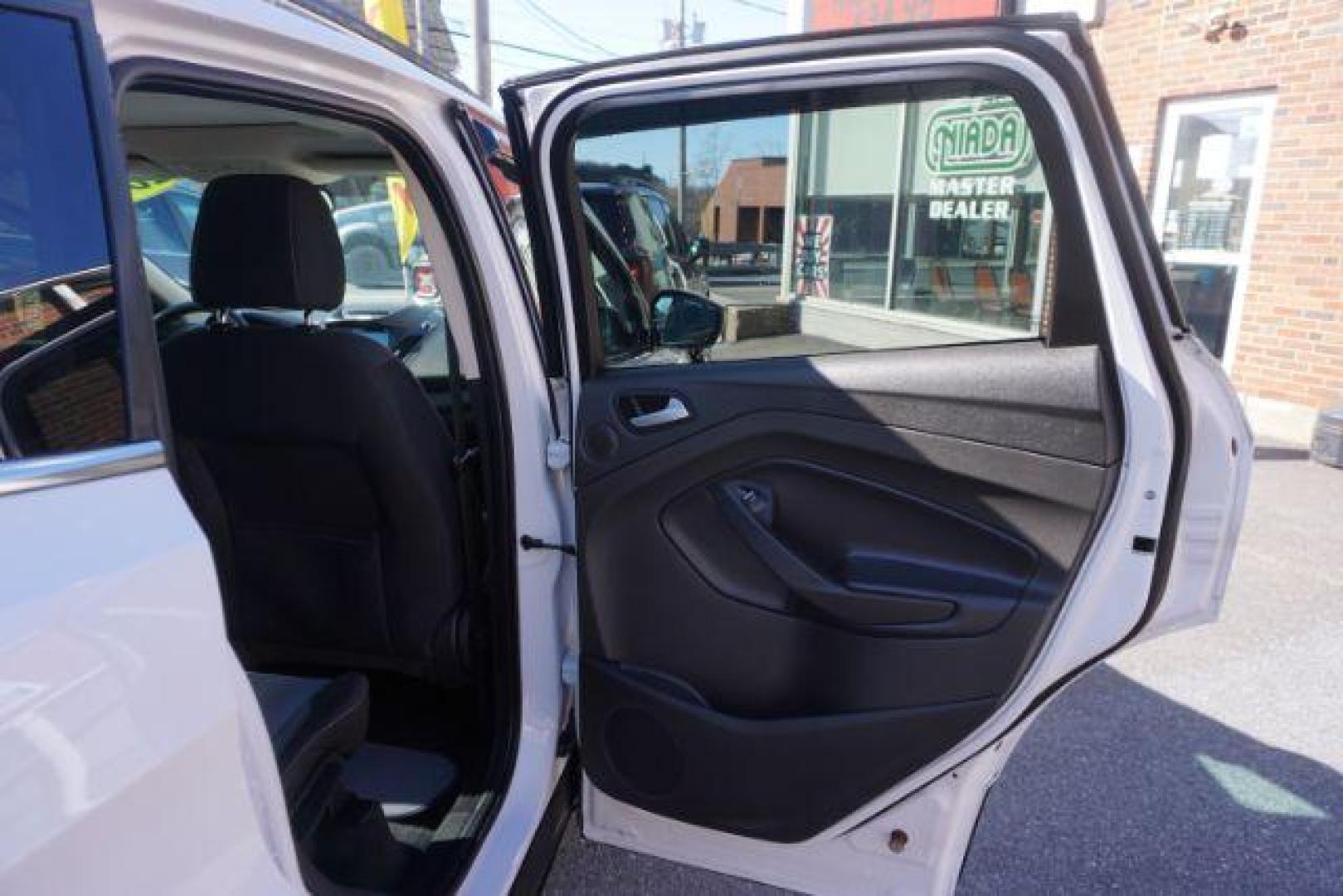 2017 Oxford White /Charcoal Black Ford Escape SE (1FMCU9GDXHU) with an EcoBoost 1.5L I-4 gasoline direct injection engine, located at 312 Centre Ave, Schuylkill Haven, PA, 17972, (570) 593-5278, 40.638130, -76.177383 - blind spot monitor, heated exterior mirrors, heated front seats, leather seats, luggage rack, navigation, power passenger seat, power sunroof, rear parking sensors - Photo#41