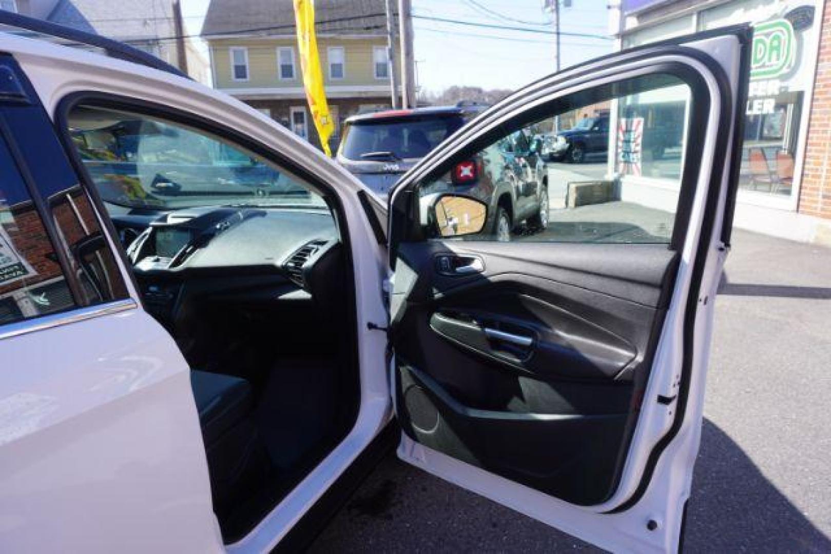 2017 Oxford White /Charcoal Black Ford Escape SE (1FMCU9GDXHU) with an EcoBoost 1.5L I-4 gasoline direct injection engine, located at 312 Centre Ave, Schuylkill Haven, PA, 17972, (570) 593-5278, 40.638130, -76.177383 - blind spot monitor, heated exterior mirrors, heated front seats, leather seats, luggage rack, navigation, power passenger seat, power sunroof, rear parking sensors - Photo#45