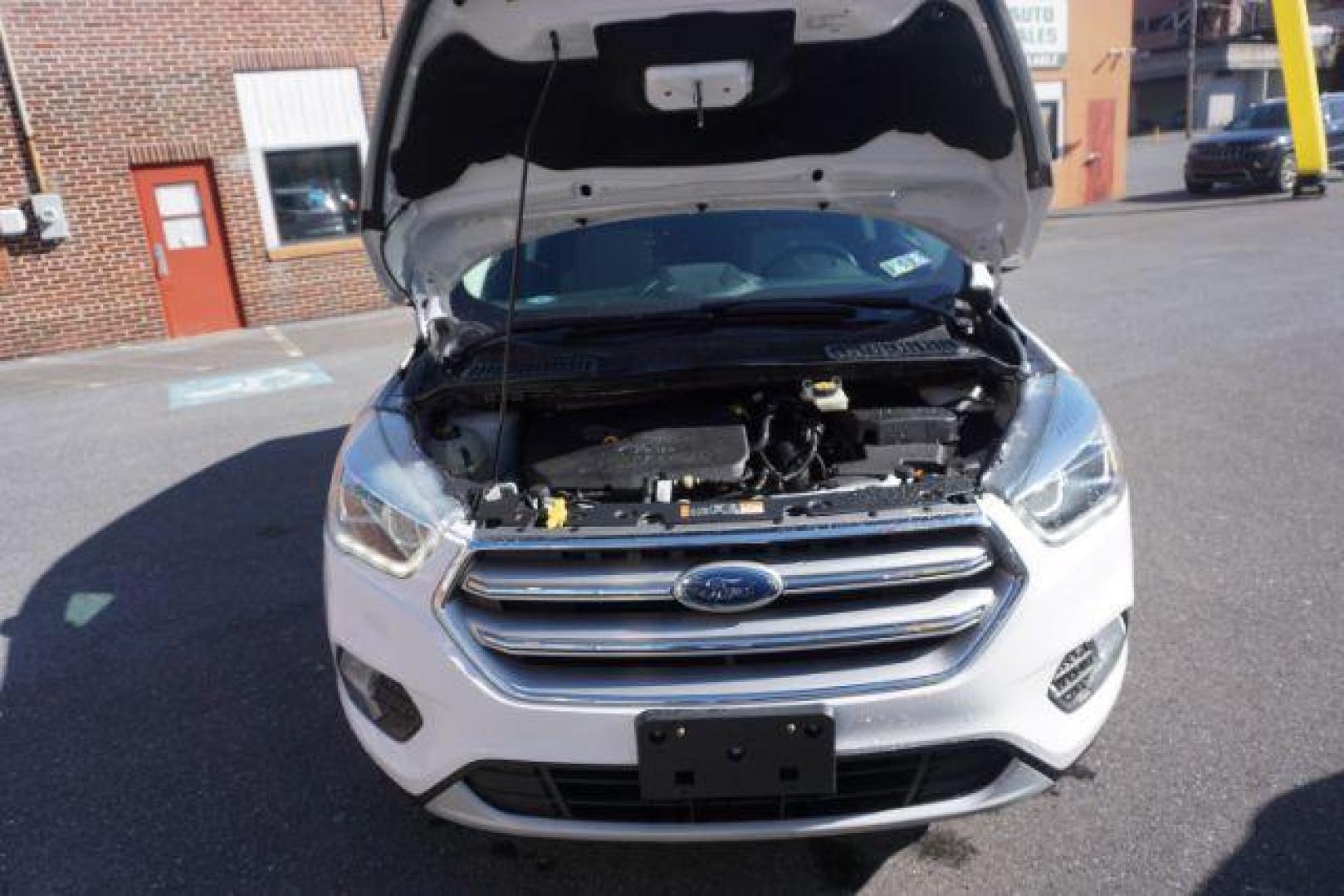 2017 Oxford White /Charcoal Black Ford Escape SE (1FMCU9GDXHU) with an EcoBoost 1.5L I-4 gasoline direct injection engine, located at 312 Centre Ave, Schuylkill Haven, PA, 17972, (570) 593-5278, 40.638130, -76.177383 - blind spot monitor, heated exterior mirrors, heated front seats, leather seats, luggage rack, navigation, power passenger seat, power sunroof, rear parking sensors - Photo#52